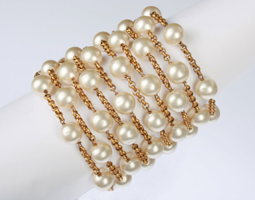 This fabulous statement making bracelet has ten strands with 50 Pearls. Marked on an oval hang tag..CHANEL...Made In France