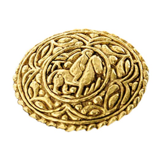 Vintage Chanel gold brooch with intricate engraving featuring a man riding a horse. Measurements- Diameter: 1.75; Interior circle: .75 The earrings make this a rare and fantastic set.