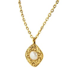 Vintage Chanel Gold Necklace with Intricate Pearl Pendant