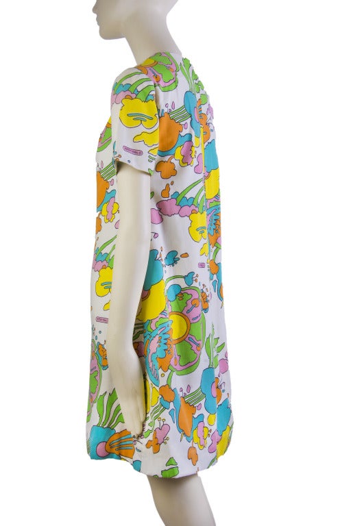 Peter Max Printed Shift Dress
Cotton Lined
Short Sleeves & Round Neckline 
Pocket Detail on Right Side
Long Zipper in Back