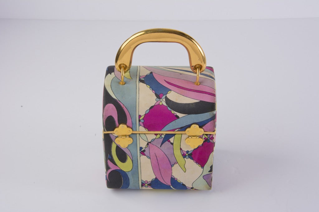 Emilio Pucci Box Purse
Silk Print 
Signed Emilio
Gold Tone Metal Handle, Closure and Hardware
Interior and inner pocket are lined with teal silk fabric
Very Sturdy
General vintage wear to exterior
Drop Measurement: 2