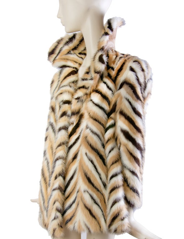 Mink Coat
Diagonal Multi Color Striping
Long Sleeve
Collar has leather backing
Hidden Hook Front closure
Two Front Pockets
Lined
Reminiscent of the mink Sharon Stone wore in the hit movie Casino!