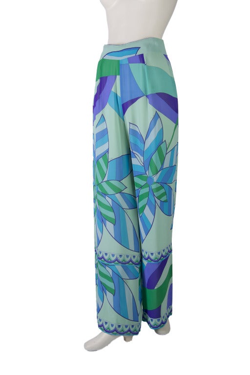 Emilio Pucci
Blue, Green, Seafoam Floral Print
Vintage Size 10 which is equivalent to todays' Euro sizes. 
Hidden Zip, Snap and Eye Hook up the back
Made in Italy
Please check measurements, this 10 runs small.
There is also a matching blouse