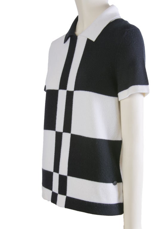 Chanel Sweater
Short Sleeve
Collared
100% Cashmere
Black & White Color Block
New with Tags