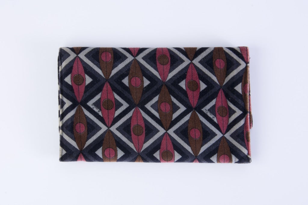 Emilio Pucci Clutch Purse
Fold Over with Snap Closure
Black, Burgandy, Brown and Grey Pucci Print on Velvet
Measures 8