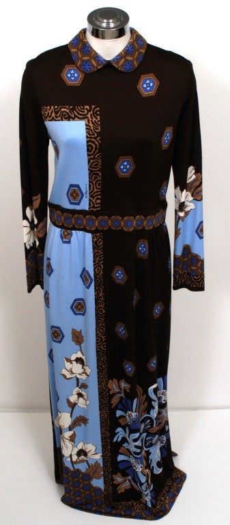  If you are a follower of Pucci and Leonard of Paris, add this fabulous chocolate brown and blue floral op art maxi dress by Paganne to your collections. Long sleeves, peter pan collar. Invisible back zipper with hook & eye clasp.
Bust 35