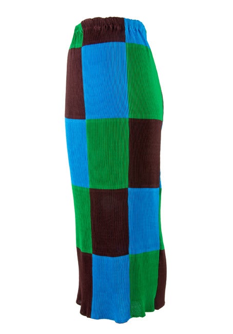 This beautiful Issey Miyake maxi skirt is comprised blue, green and brown colors. Absolutely stunning.
Maxi Skirt 
Blue, Green, Brown Color Block
Elastic Waist 
Tightly pleated
Made in Japan
100% Polyester
Stretchy and comfortable