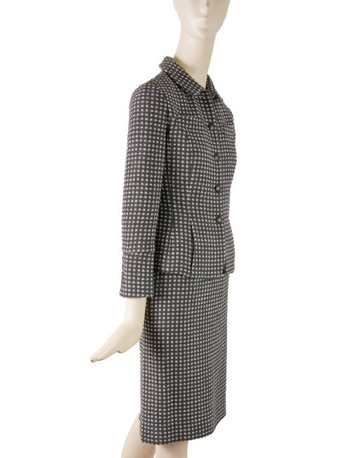 Rena Lange
Two Piece Skirt Suit
Jacket is long sleeve
Lined with Four button Closure
Skirt is lined with slit in back
Skirt has zipper closure with eye hook
Made in Slovenia
Marked Size US4
65% wool & 35% polyam
Jacket measurements
Waist