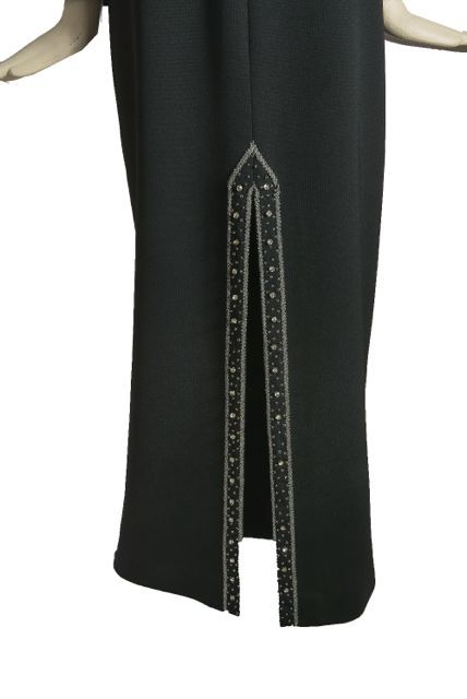 Late 60's, early 70's Jean Lutece vintage black maxi dress with open sleeves and beaded slit. The sleeves are opened and held together with large glass rhinestone Front slit is covered with beads. The plunging neckline is sexy but not too flashy.