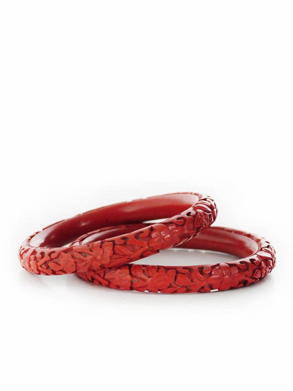 Vintage Chinese hand carved traditional red cinnabar bangle bracelets.

Measurements-

Length (measured inside of bangle): 7.5