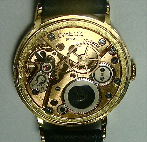 Men's OMEGA Yellow Gold Wristwatch with Sweep Seconds and Unusual Dial circa 1948 For Sale