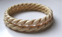 Ivory Bracelets Wrapped in Yellow Gold