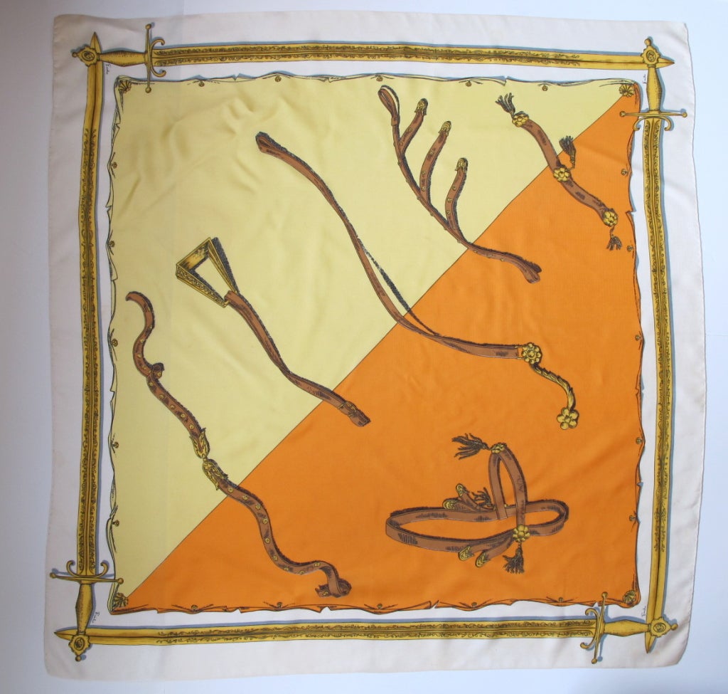 Gorgeous vintage Pucci scarf with sword border and leather horse bridle and breastcollar illustrations in center.