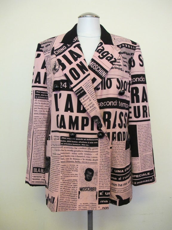 Exciting and collectible Moschino Couture light pink and black Italian newspaper print jacket with original tag.