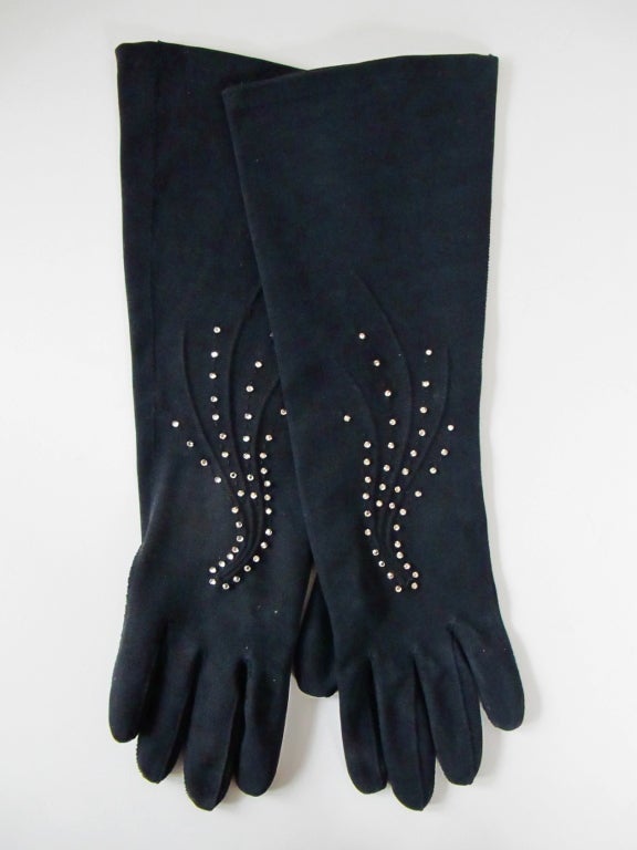 Black cotton gloves embellished with rhinestones. 13 inches long.