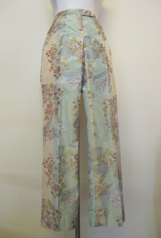 Fabulous fabric: floral designs with color palette of light golden beige background with silver, gold, baby blue, salmon, pink and brown. These pants are luscious.