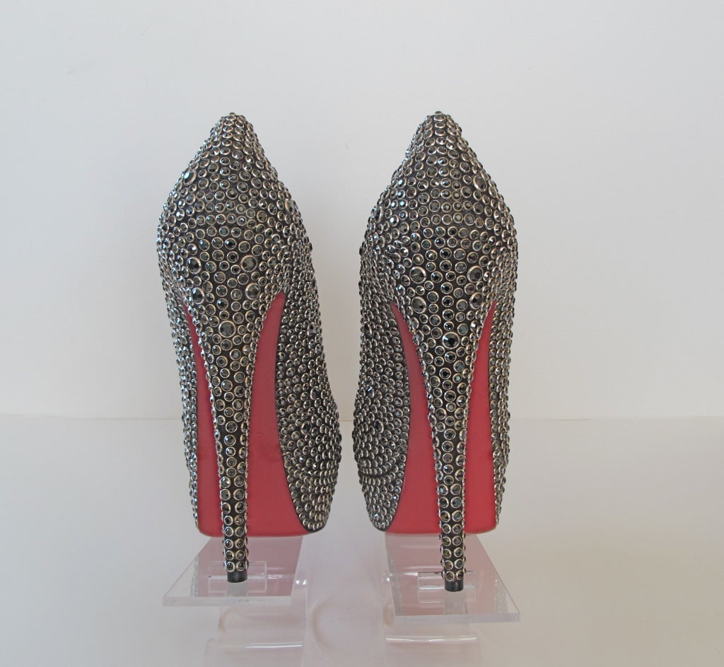 Stunning shoes which sell for $6,500.00 1&1/4 inch platform and 6 inch heels. Peep toe. Original box.