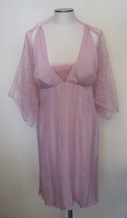 Halter silk chiffon cocktail dress with bra inserts and lace V shape design; lace matching bolero with silver threads  throughout bolero. Color is a rich, yet delicate, rose pink lilac. Made in 2004.
