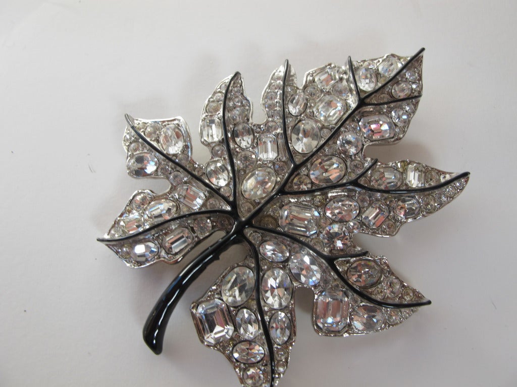 Show-stopping silver tone leaf brooch with black enamel 