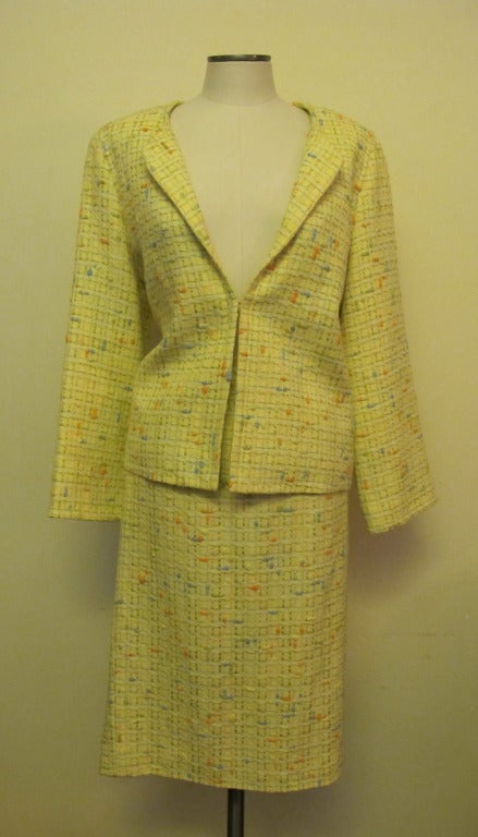 Yellow background, multi color cotton suit with pastel palette of powder blue, pale orange, lime green. It is so chic and perfect for business meetings, luncheons and early cocktail hour.  Skirt Length 25.25 inches, Jacket Length 23.5, Sleeve length