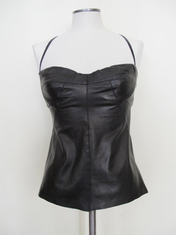 Dynamic black leather top with spaghetti straps with full length gold zipper. The leather is very, very soft - lamb leather.