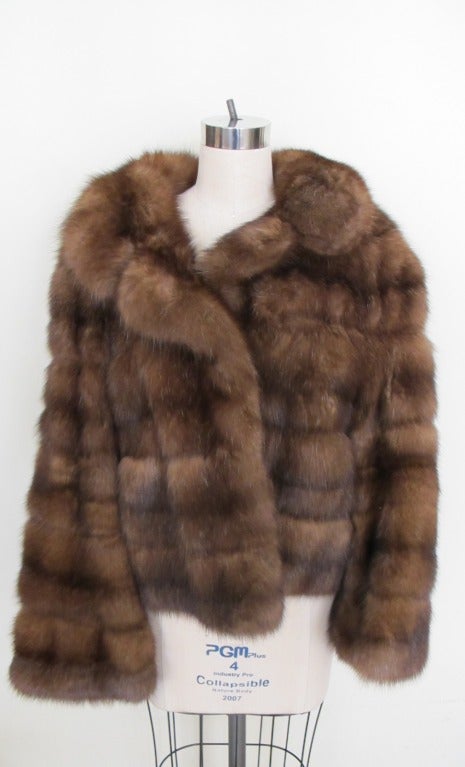 Natural frosted, striped, horizontal sable jacket. 
Double fur notched collar.
Silk Bemberg lining - golden color. Pockets with lining. 
47 inch sweep. Sleeve length 27 inches.