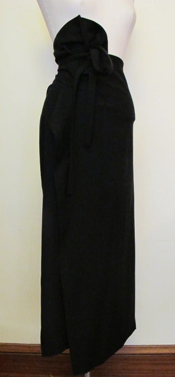 Jean Paul Gaultier Femme long black skirt with flat accordion pleats cascading down from the top of skirt to bottom of skirt on left side only. Fabulous when worn. 32 waist can be made bigger.