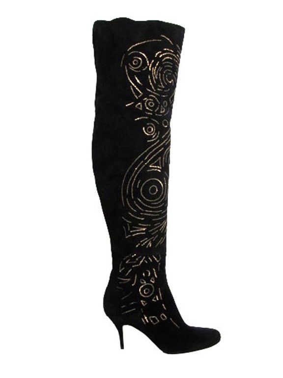 You'll rock the town in this fabulous pair of Emilio Pucci black suede over-the-knee boots. Boots feature a rounded toe with 3.5" self covered heel, seam from toe to ankle where next panel of suede to top of boot is sewn. Miniature gold metal