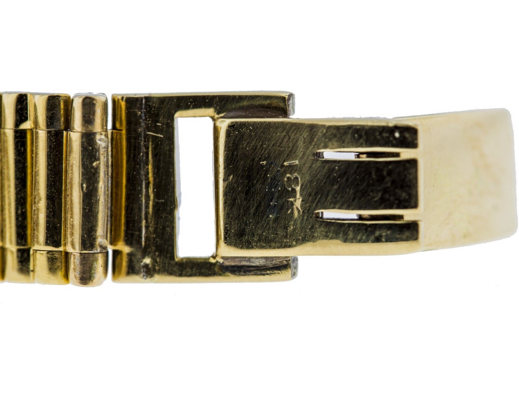 Rare lady's dress watch made by Audemars Piguet and retailed by Carier. Movement No. 66'117. 

Cal. 2005 mechanical back-wound and set movement, 17 jewels, silvered matte dial, applied baton numerals, rectangular shaped case, diamond set bezel,