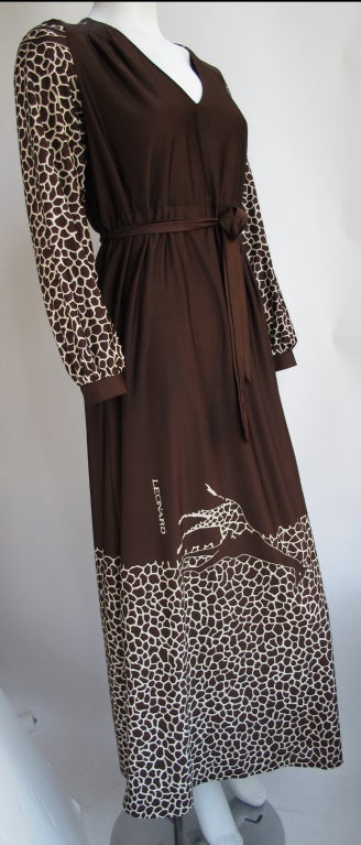 Vintage Leonard Giraffe motif floor-length dress in a silk nylon with matching belt/sash. Designer label not present; fabric attributed to Leonard Paris (signed five times.) No size tag present; comparable to modern size small or