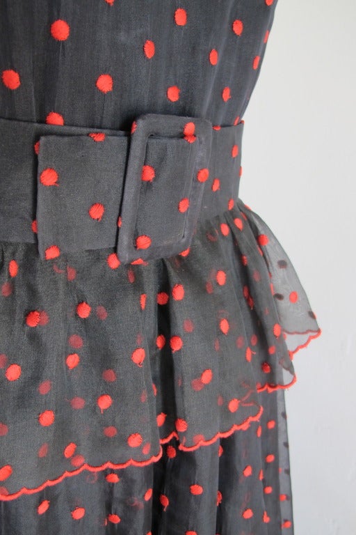 Oscar de la Renta 1970's double layered silk organza, black and red polka dot patterned maxi dress with ruffled trim. Comes with matching belt. No size tag so please consult measurements. In very good condition with a few loose threads on the polka