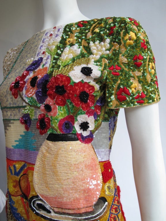 This Bill Blass haute couture top/blouse is one of only three such pieces ever made and originates from Blass's 1988 Spring/Summer Collection. Employing a variety of materials and techniques (sequins, a multiplicity of different beads, wool