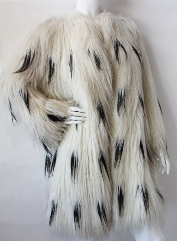 A larger than life faux fur coat by Pauline Trigere.
Measurements:
Length - 35