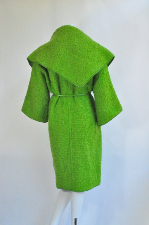 Vintage Bonnie Cashin for Sills Lime Green Boucle Wool Coat, c. 1960s, labeled, retailed by Saks Fifth Avenue, with matching lime green leather trim and belt, oversized collar, gold-tone stickpin closure and lined pockets. Can fit a small/medium or