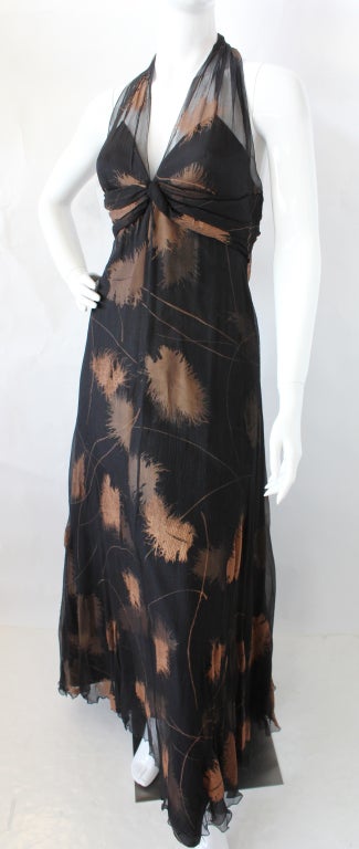 Chloe of Karl Lagerfeld era halter gown fashioned from two layers of silk and a bronze-colored silk screened leaf print. This is one of my favorite dresses I've ever acquired - totally unique and filled with excellent details.
The bottom layer is