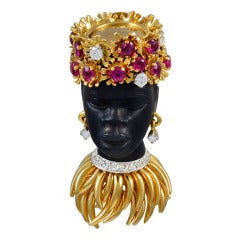 A superb jeweled Nubian Princess clip brooch, circa 1960