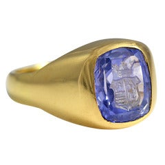 A Cornflower Sapphire Intaglio Gold Signet Ring