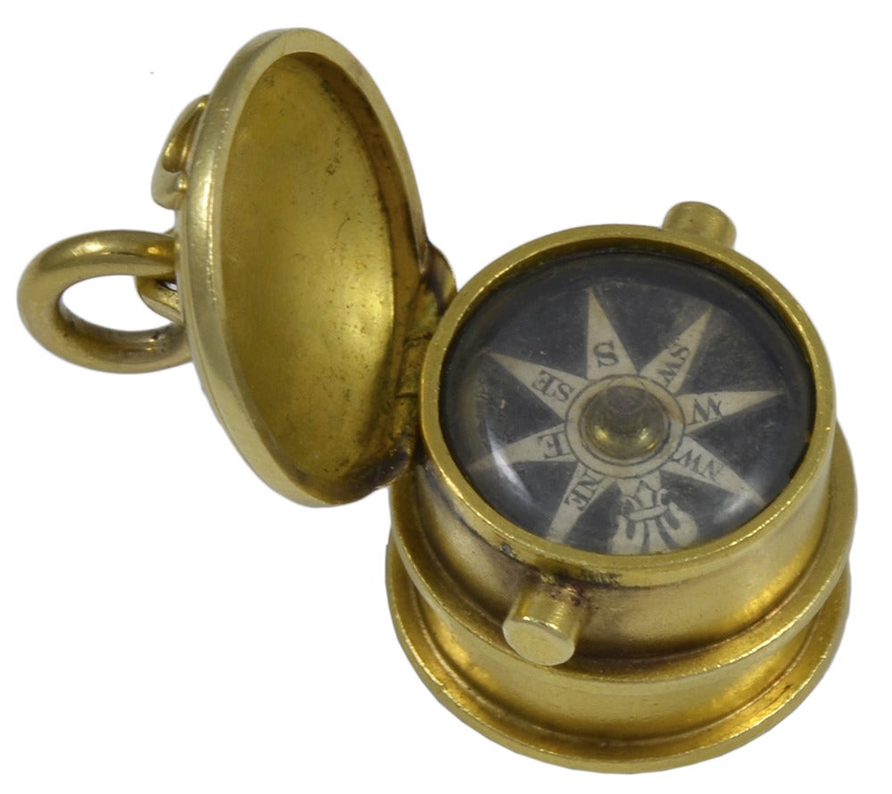 The top opens to reveal a working compass and the base is set with a fine piece of blood stone which has not been engraved. This is an excellent opportunity for  a new owner to have their crest or initials carved by Dexter's Seal Engraving or a