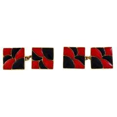 A Pair Of Art Deco Gold And Enamel Cuff-links