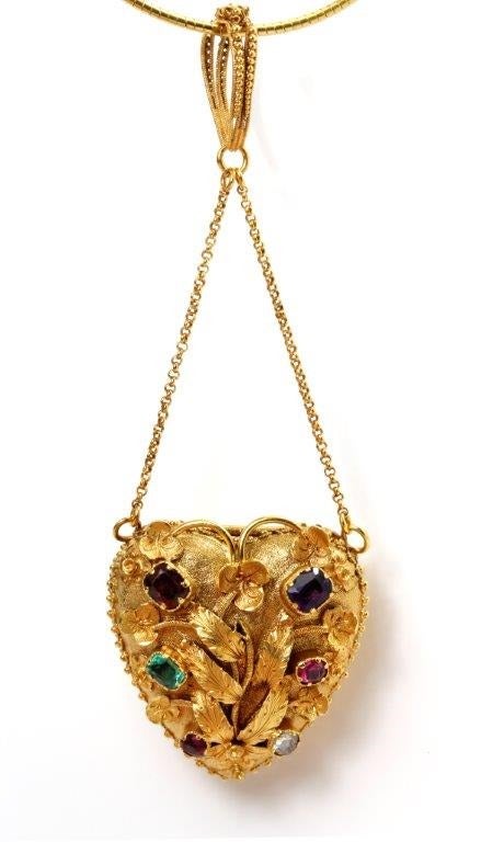 Which opens to reveal a glazed compartment which would have contained a lock of an admirer's hair.The central Gold leaves and the gemstones represent multi coloured flowers spelling REGARD
Ruby Emerald Garnet Amethyst Ruby Diamond.
The textured