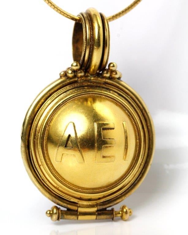 On the reverse are the letters AEI in relief, which is a Latin abbreviation. The pendant opens to reveal a locket in which Roman girls two thousand years ago, carried magical items to bring good fortune in marriage. The generous bale allows this