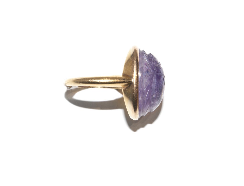 This type of cloudy Amethyst which was mined by the  Ancient Egyptians was one of their six precious stones. This Scarab was carved and mounted in the late 1920's because of the huge western demand for artifacts after the discovery of Tutankhamen's