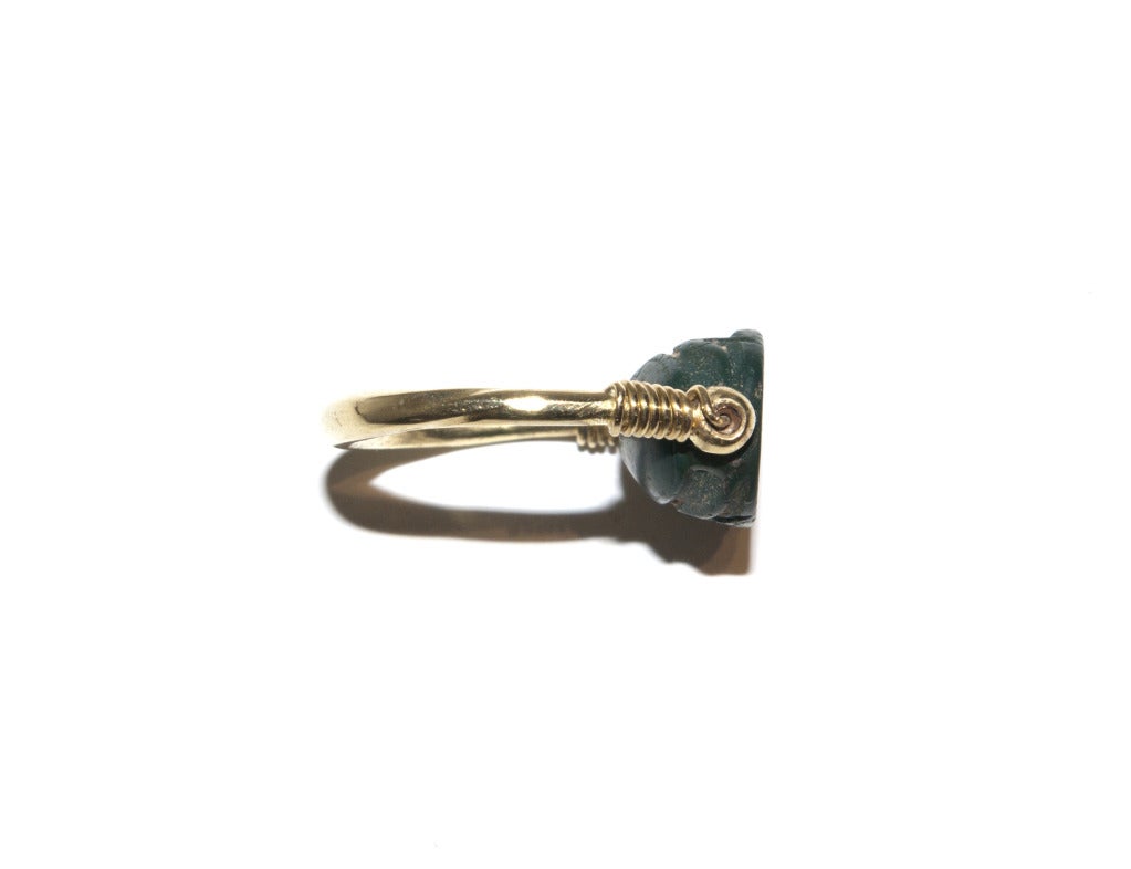 Georgian An Ancient Greenstone Scarab in a Gold Stirrup Ring Mount