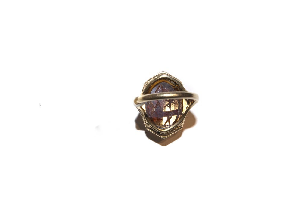 An amber coloured carved Citrine Scarab Ring
