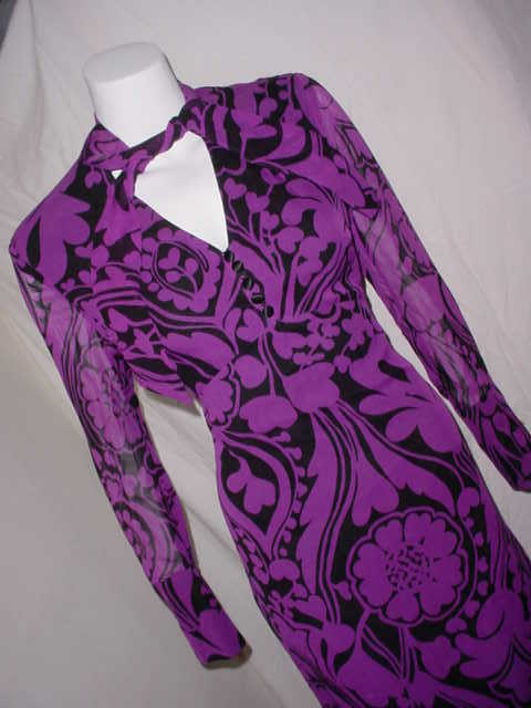 Beautiful silk dress by Escada with necktie. Purple and black Art Nouveau print. Center back zipper. Excellent condition, appears to be unworn. Labeled size 38. 37 inch bust, 30 inch waist, 37 inch hips, 42 inches long.
