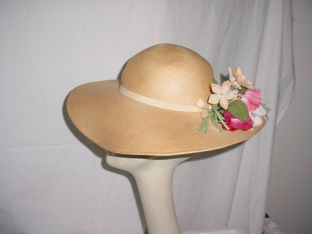 Vintage 1970s Frank Olive hat. Natural straw with ribbon and bouquet of flowers.