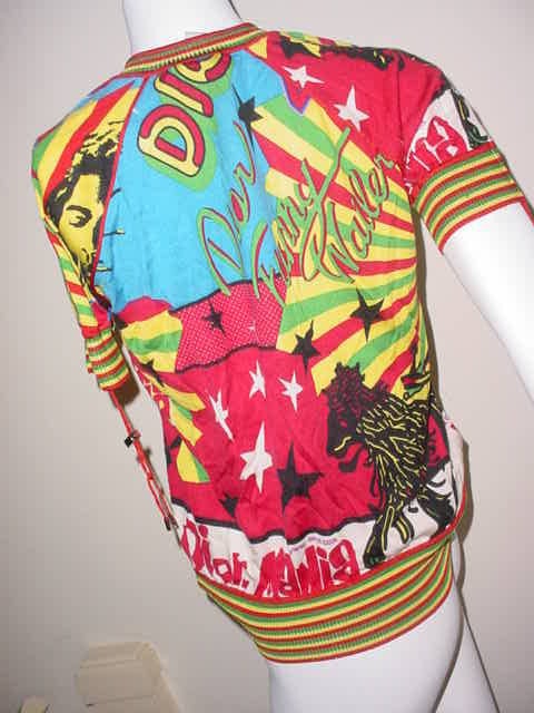 Christian Dior Paris colorful, vibrant Rasta Reggae Pirate zip-front sweater. Wool,viscose,silk and cashmere. Circa 2005. Unworn with original tags. US size 6