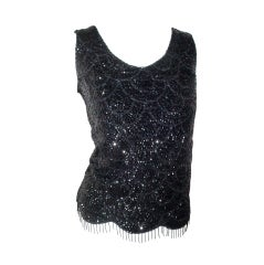 Vintage 1960s black sequin and bead sweater with fringe