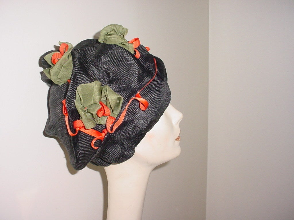 Vintage black straw hat by Coup de Chapeau San Francisco. With orange and green ribbon trim. Unworn, excellent condition