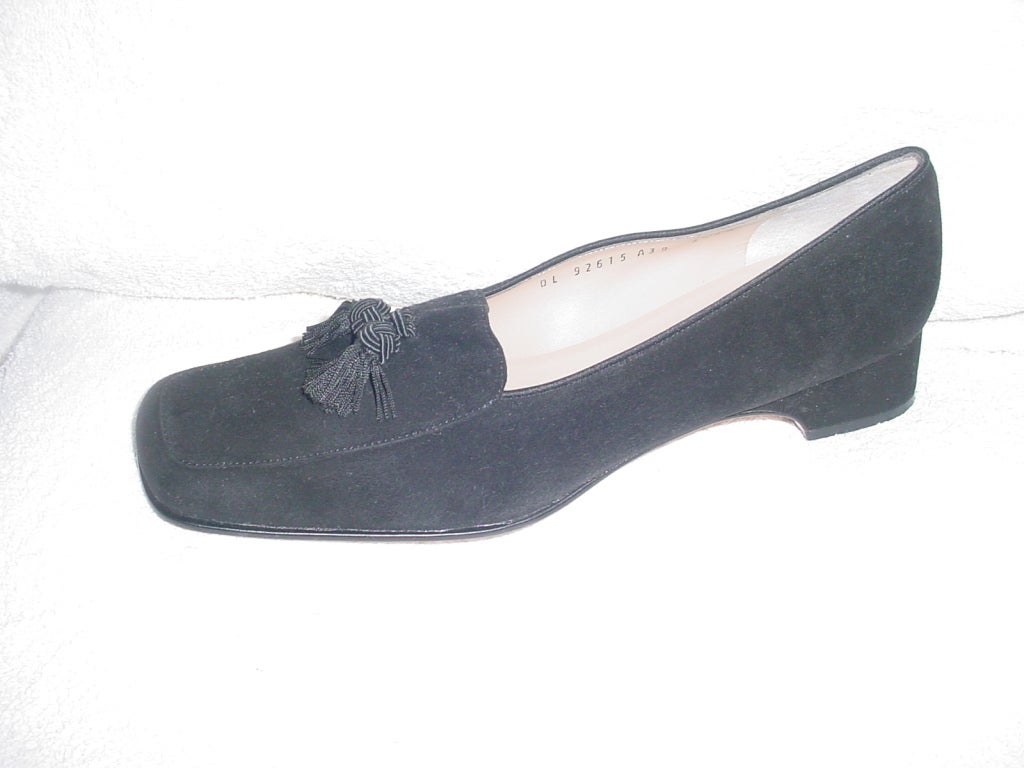 Salvatore Ferragamo black suede loafers with tassels. Worn only once. Size 9.5 AAA.  1.5 inch heel.  3  1/4 inch ball.  11 inches long.